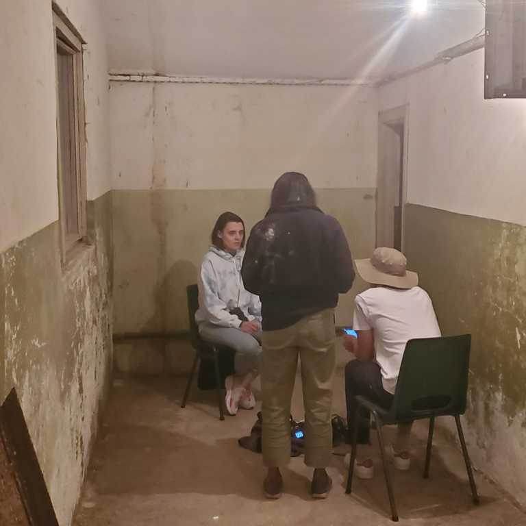 An imprompteau interview while sheltering in an air raid bunker.